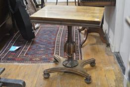 A William IV rosewood occasional table, the (faded) rectangular top above a moulded frieze, raised