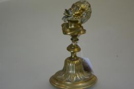 A bronze novelty table lighter, c. 1900, cast as the bust of a Moor, the mouth open for a taper