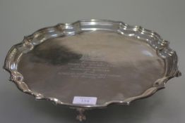 A silver salver, A.E. Jones, Birmingham 1969, in the Georgian taste, of circular form with