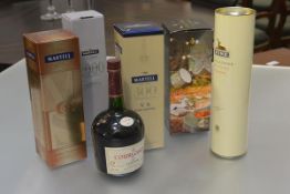 A group of cognacs comprising: Hine Signature Petit Champagne, 70cl, boxed; Courvoisier Here's to