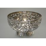 A Chinese Export silver bowl, early 20th century, of circular form, elaborately pierced with