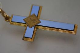 A 19th century cross pendant, in powder blue glass, within a beaded border, mounted in yellow metal.