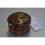 A late 19th century Tartanware cotton reel box, of cylindrical form, the cover printed with an image