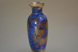 A Wedgwood dragon lustre vase, of slender baluster form, with a mottled blue ground, printed mark