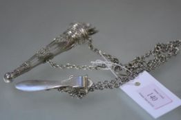 A late 19th century silver-plated and cut-glass scent bottle chatelaine, modelled as a quiver of