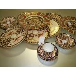 A group of Royal Crown Derby Imari wares comprising: in pattern 2451, four saucers, four side