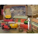 A box of 0 gauge Hornby including an oil tanker (boxed), assorted track, buildings and rolling