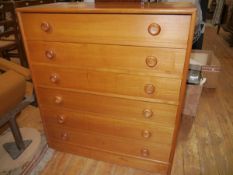 A mid-century teak chest of drawers, the six drawers with recessed disc pulls. 101cm by 91cm by