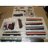 A Piko boxed German passenger train set; plus a small freight set boxed