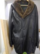 Hermes, a gentleman's black butter-soft leather three quarter length coat with Coypu fur collar,