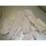 A group of lady's cream evening and other gloves