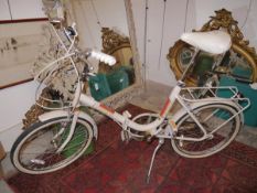 A vintage 1970's Raleigh Compact folding bike, cream with speckles, 20" road wheels, classic 3 speed