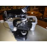 A Nikon Sk microscope complete with Nikon accessories to include medical mirror, intervalometer etc