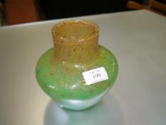 A Scottish Art Glass vase, mid-20th century, in green with aventurine inclusions, unmarked. 16cm