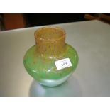 A Scottish Art Glass vase, mid-20th century, in green with aventurine inclusions, unmarked. 16cm