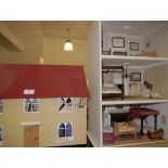 Dolls house, furniture and accessories: a small painted wooden doll's house, 20th century, the