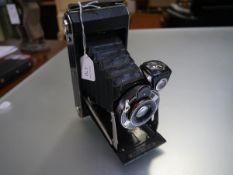 A Kodak six-16 Model C camera with Anastigmat F6.3 lens