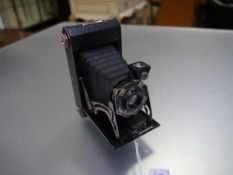 A Kodak Six-20 camera with Anastigmat F-6.3 100mm lens