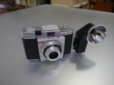 A Kodak Colorsnap 35 camera with Kodak Anaston lens mount 320 and flash