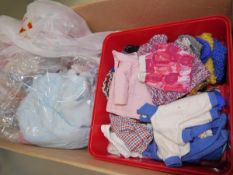 A large quantity of knitted and other doll's clothing and accessories