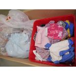 A large quantity of knitted and other doll's clothing and accessories