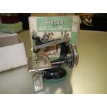 A child's Singer No. 20 sewing machine in original box