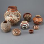 Group of 8 Pueblo Pottery Jars Largest 11 3/4 inches height