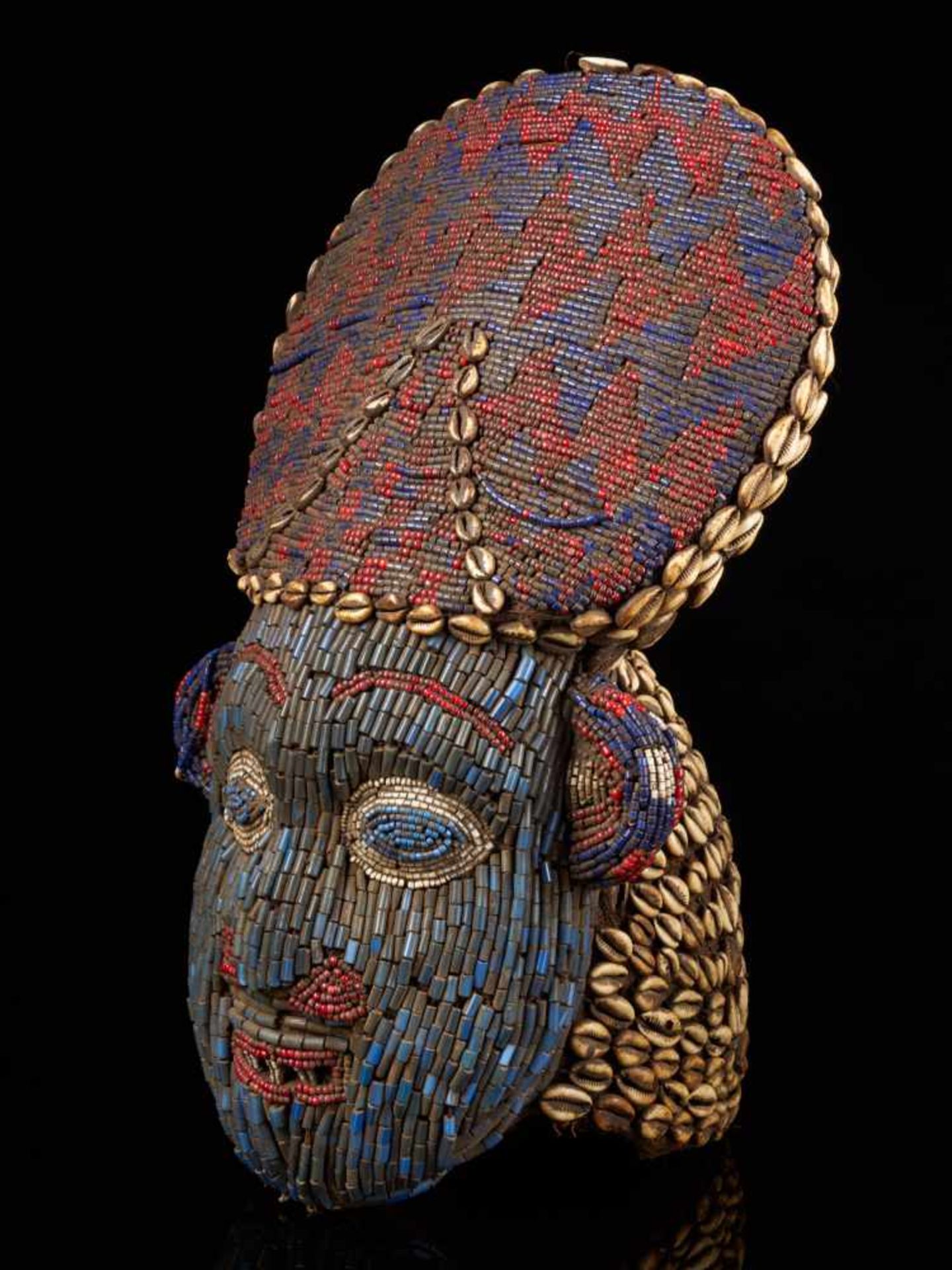 Beaded Red And Blue Helmet Mask And Kauris Decorated Back - Tribal ArtThis striking piece is