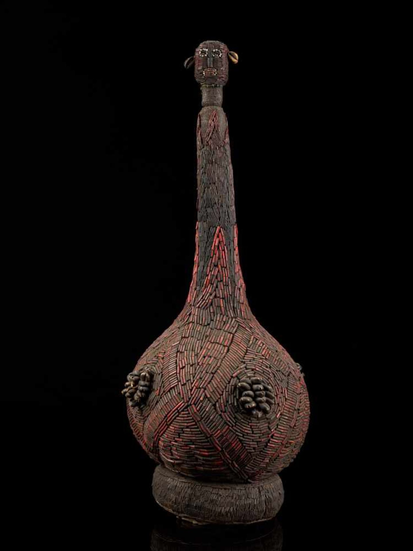 Beaded Palm Wine Vessel Topped With Human Figure - Tribal ArtThis impressive beaded wine vessel is