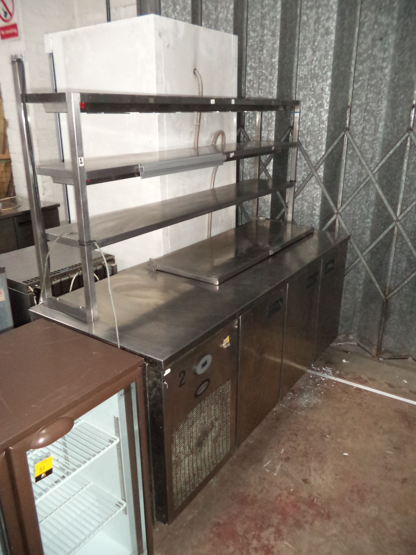 Foster stainless steel large refrigerated prep cabinet with triple doors including triple level
