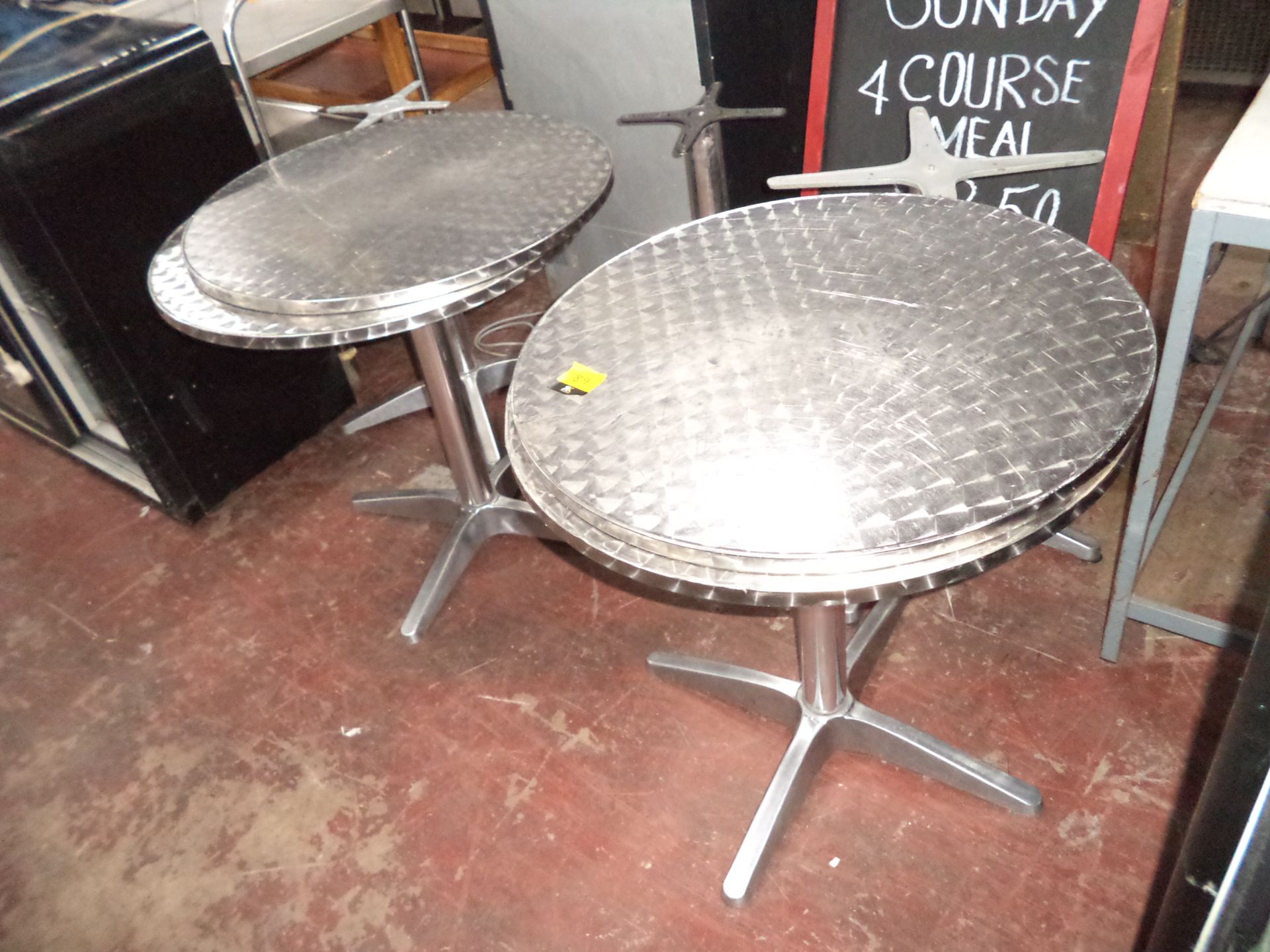 Outdoor tables comprising a total of 4 tops and 5 pedestals IMPORTANT: Please remember goods