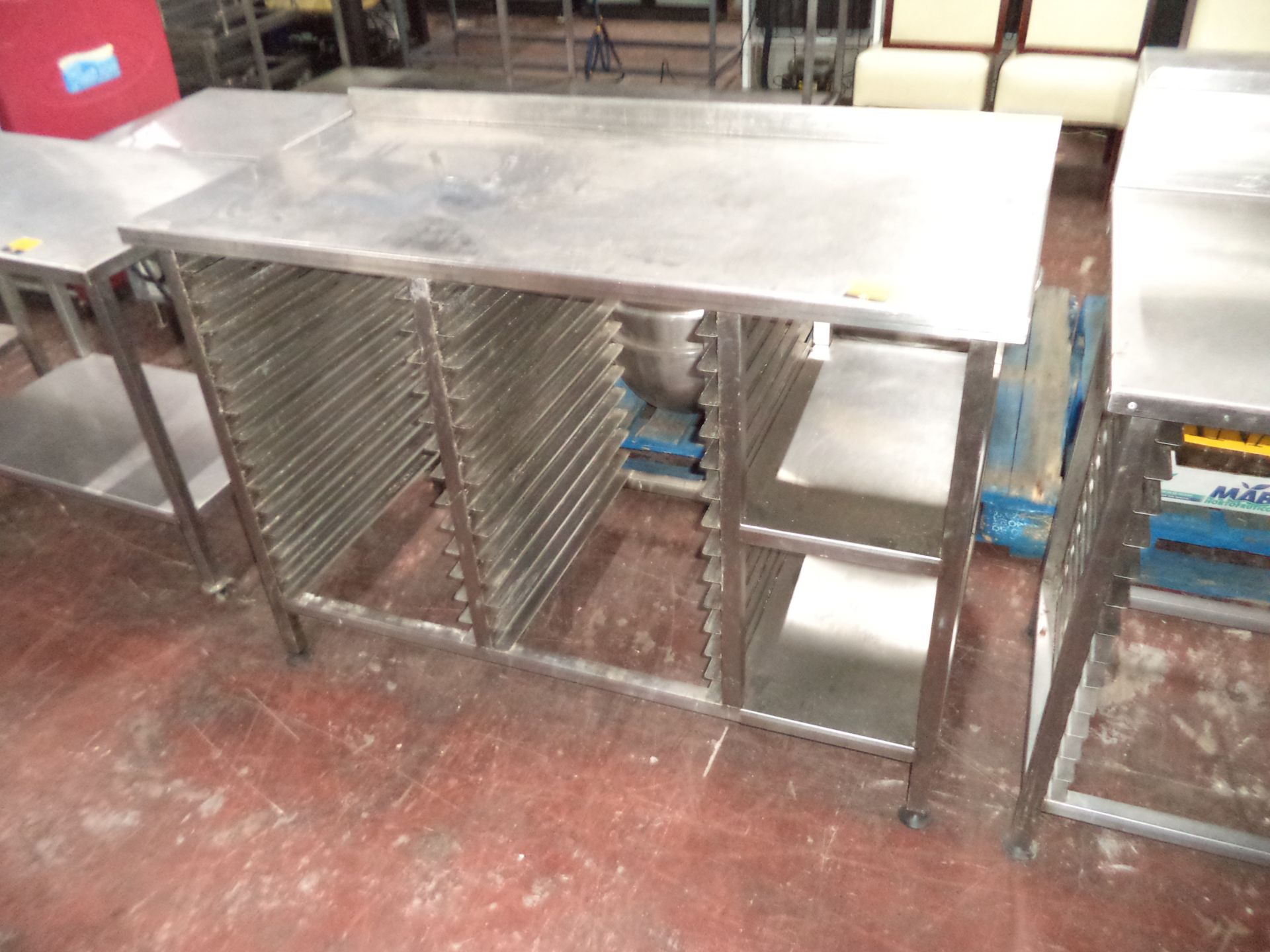 Stainless steel multi-tier table IMPORTANT: Please remember goods successfully bid upon must be paid