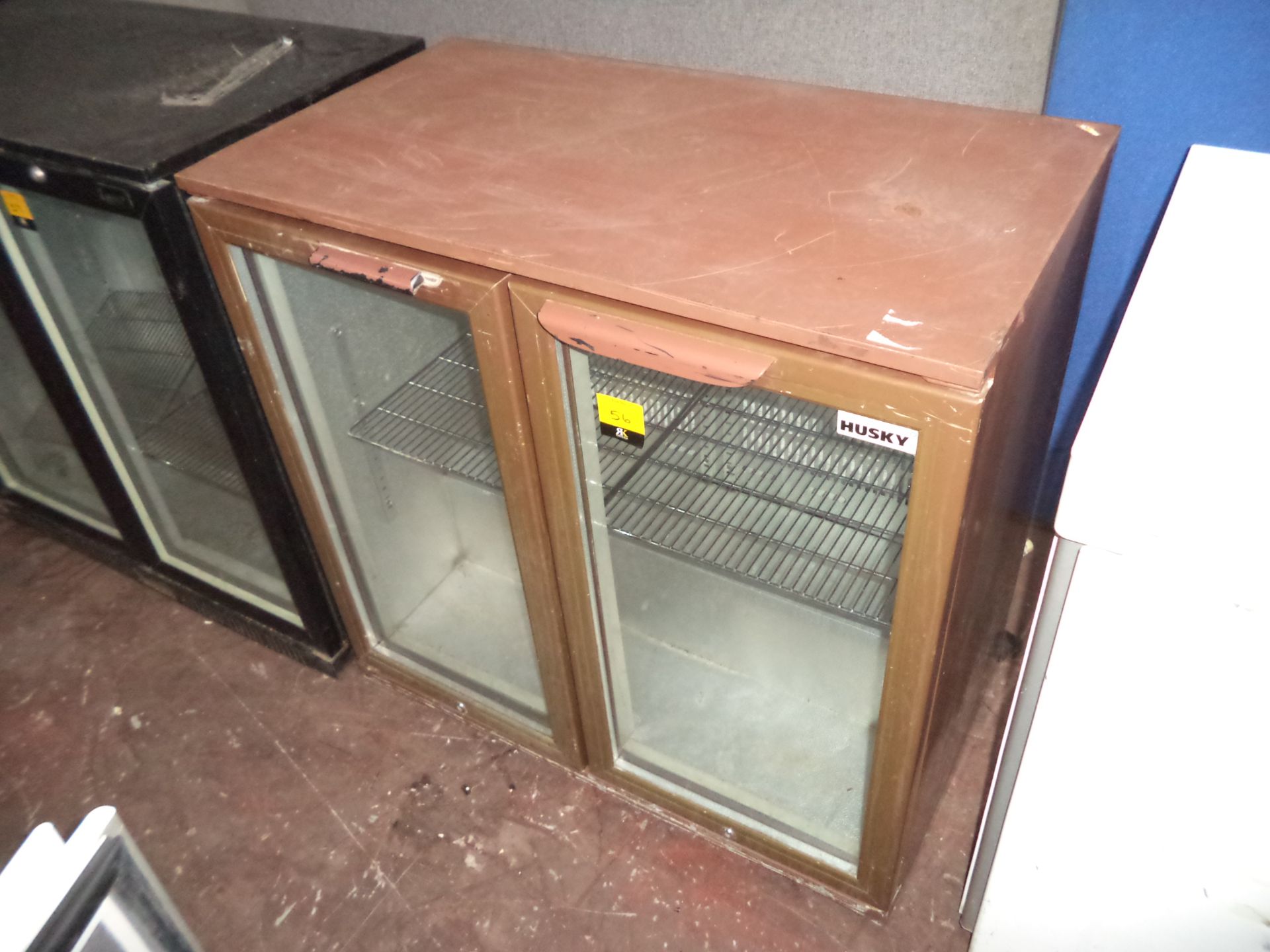 Husky brown clear twin door bar/bottle fridge IMPORTANT: Please remember goods successfully bid upon