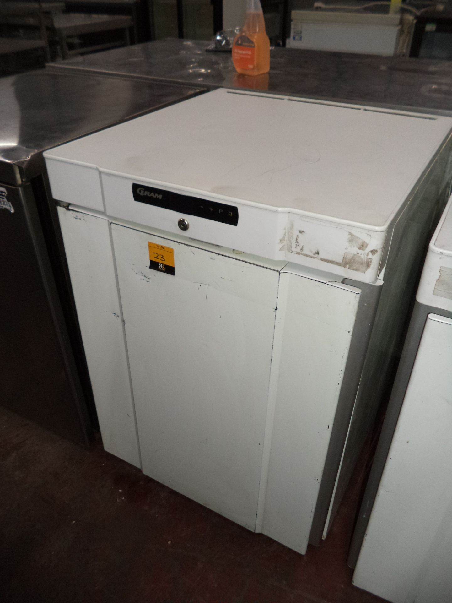 Gram counter height freezer, model F210 IMPORTANT: Please remember goods successfully bid upon