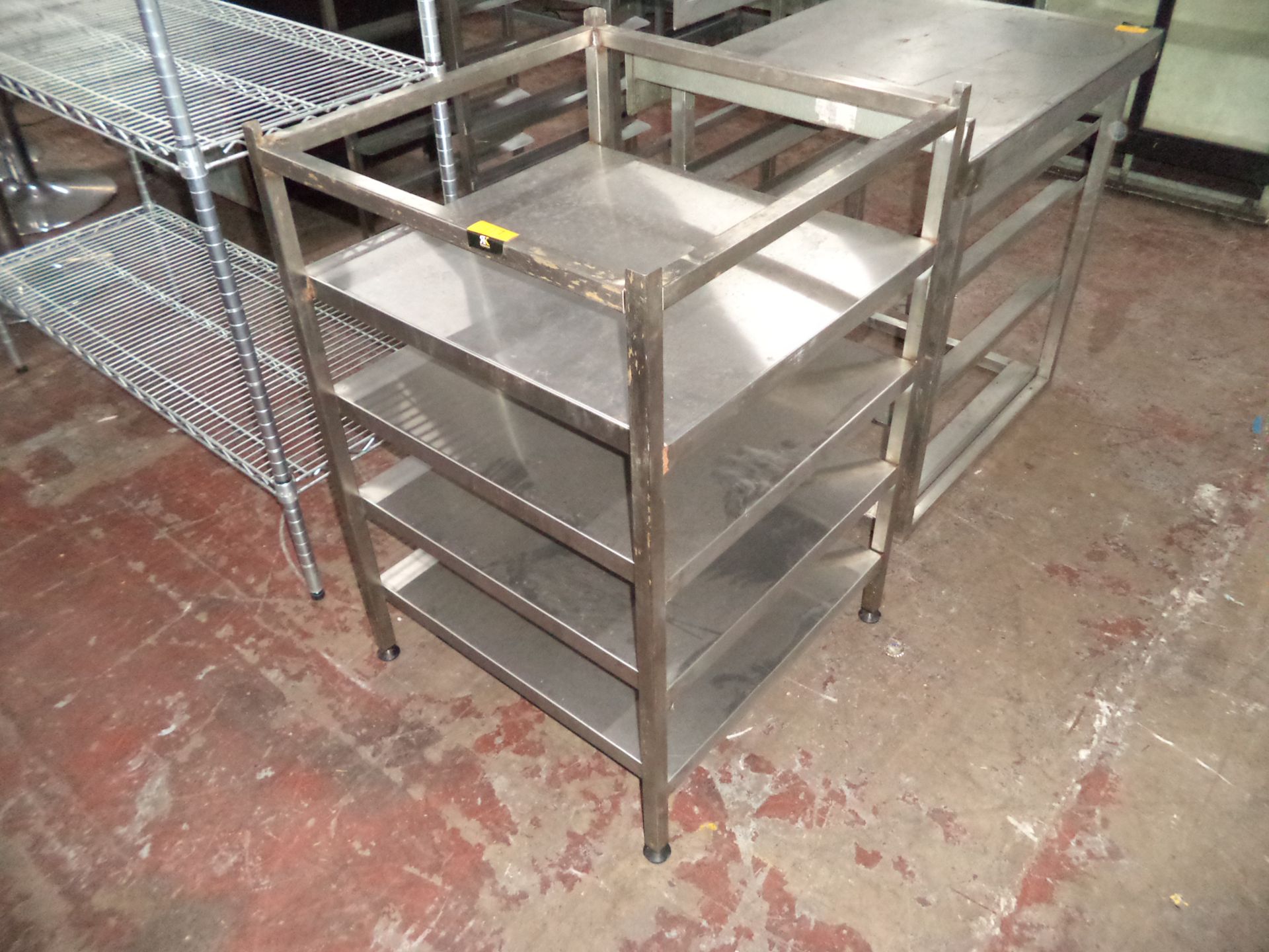 Multi-tier stainless table with footprint of circa 610mm x 610mm IMPORTANT: Please remember goods