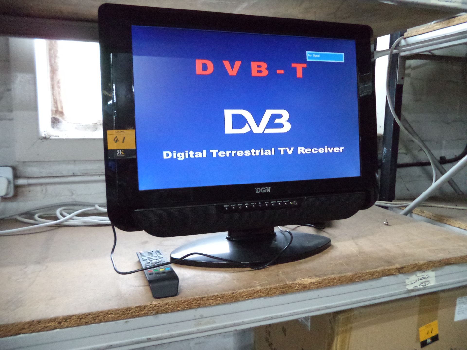 DGiM widescreen TV with built-in DVD on stand including remote control & power pack IMPORTANT: