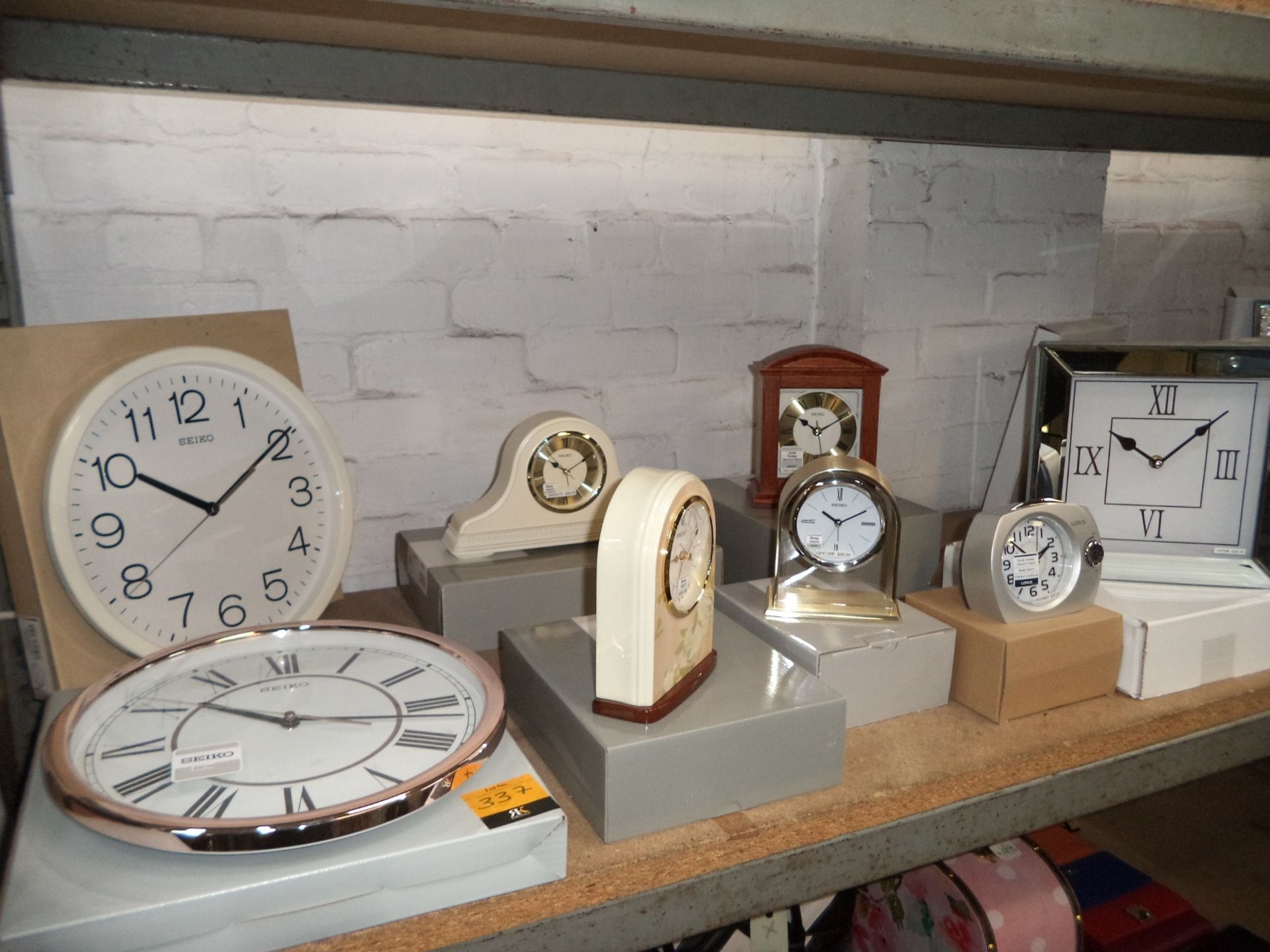 8 off mostly Seiko carriage & wall clocks plus Lorus alarm clock with RRPs up to £90 per clock