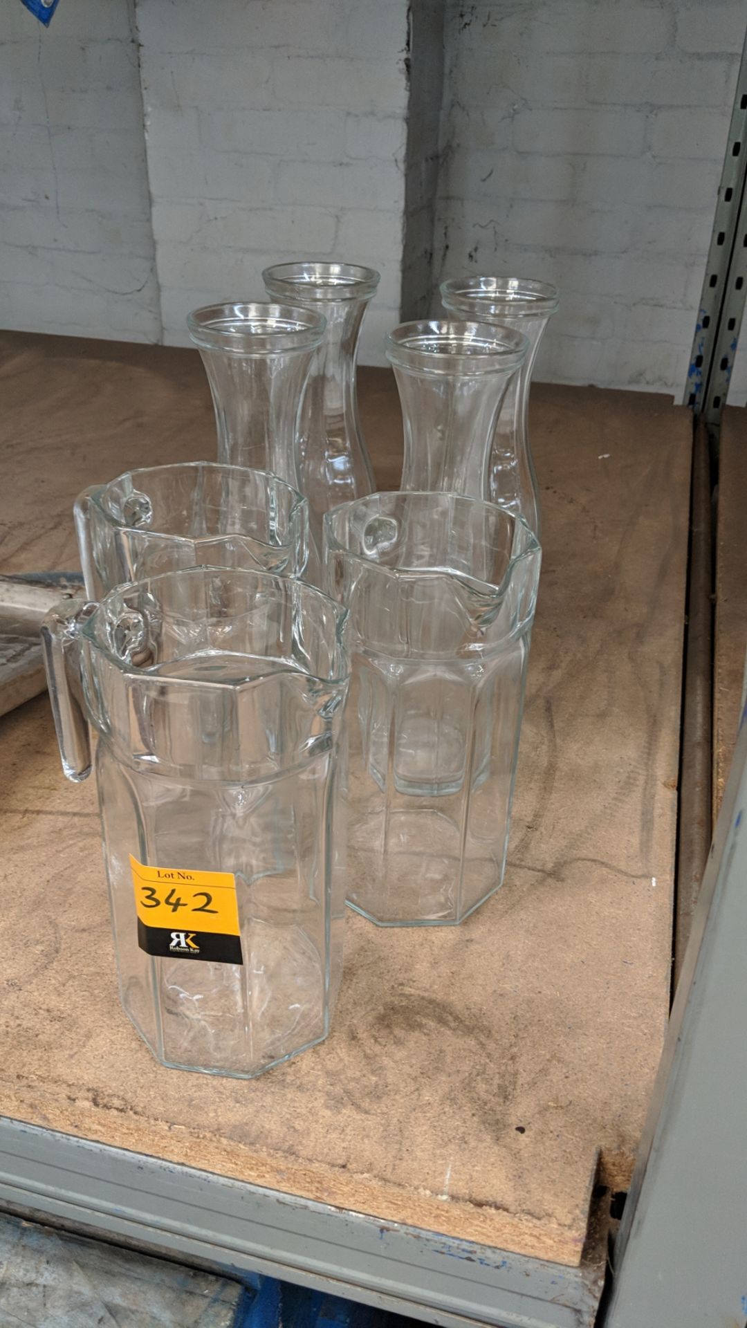 7 off assorted glass jugs and carafes IMPORTANT: Please remember goods successfully bid upon must be