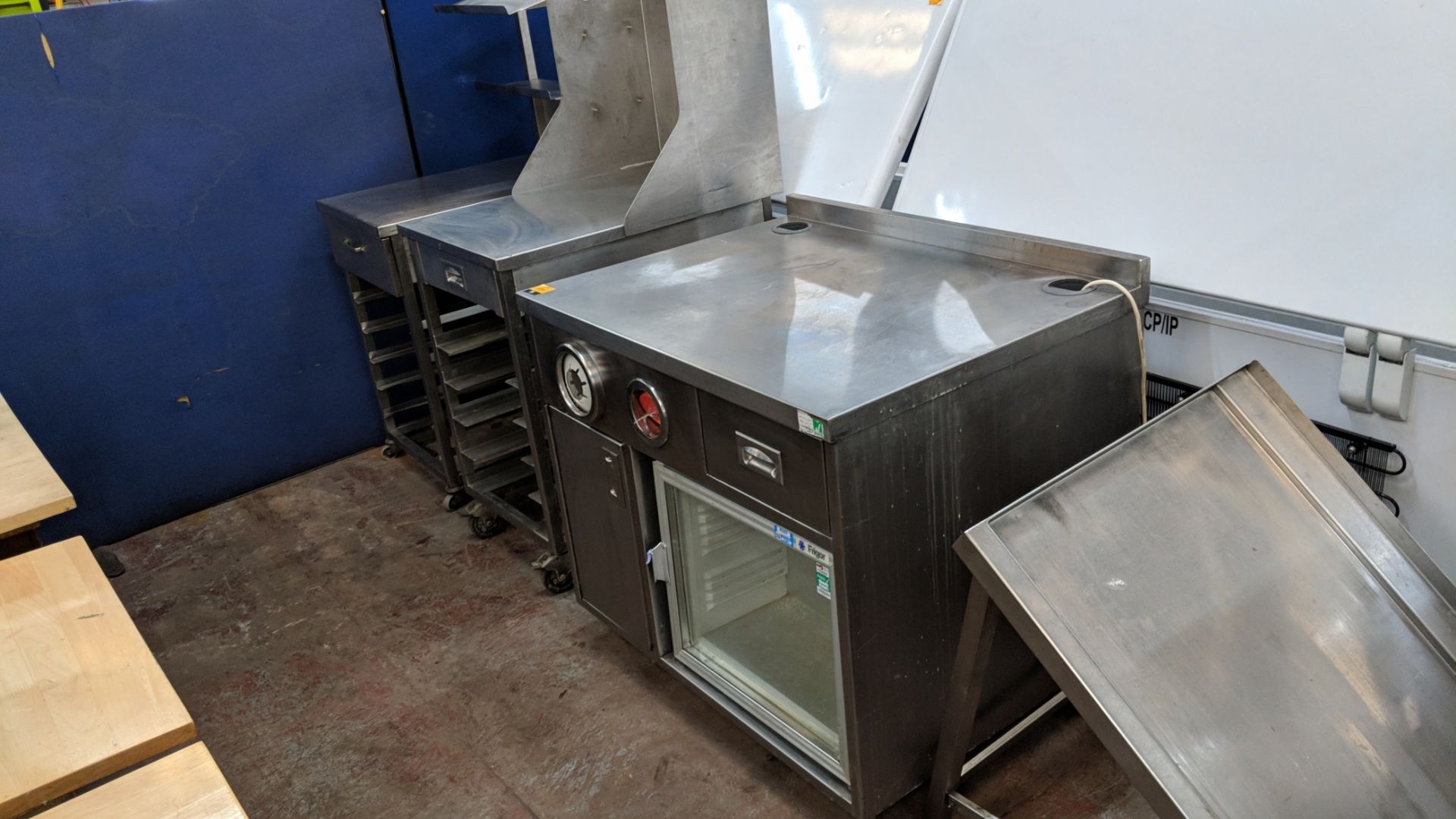 3 off stainless steel fast food serving/dispensing items, all of which are mobile, comprising