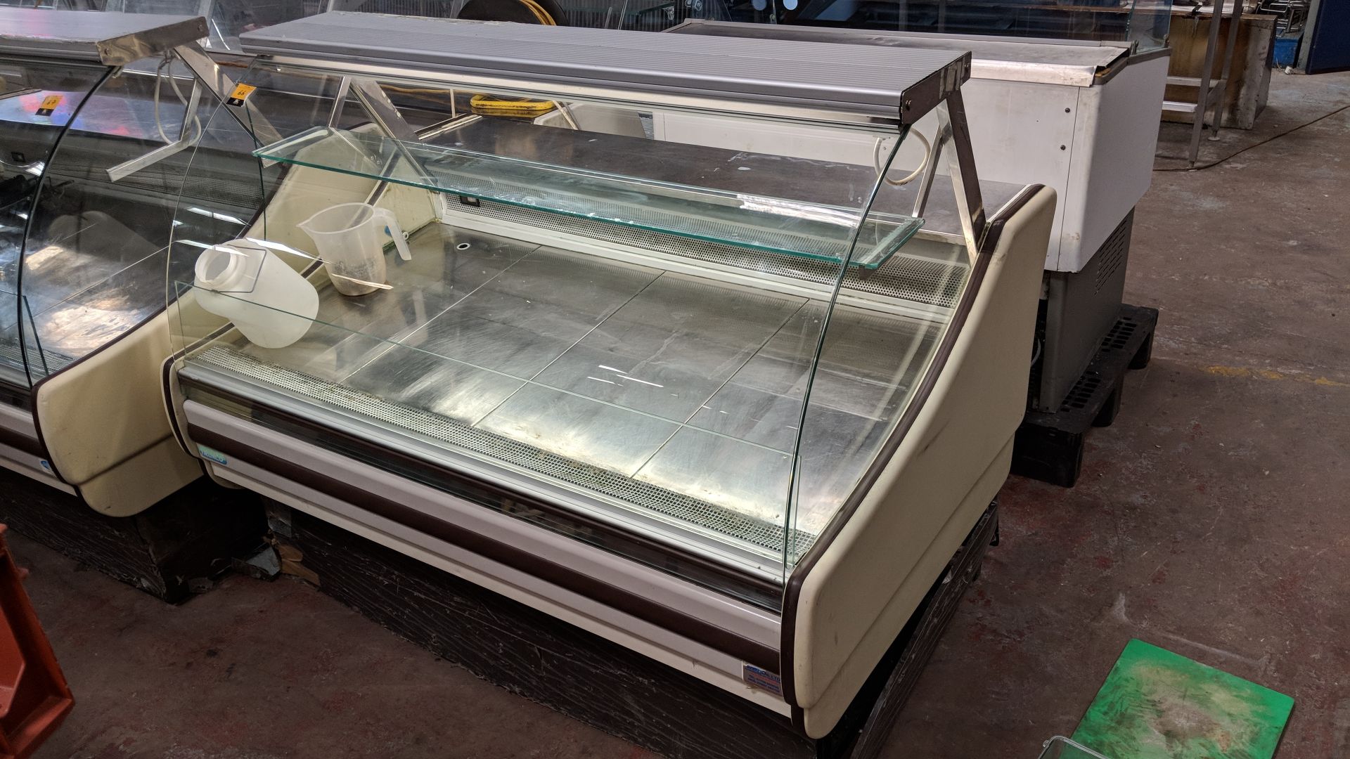 Trimco refrigerated serve over counter circa 1.5m long NB. One of the glass side panels is damaged