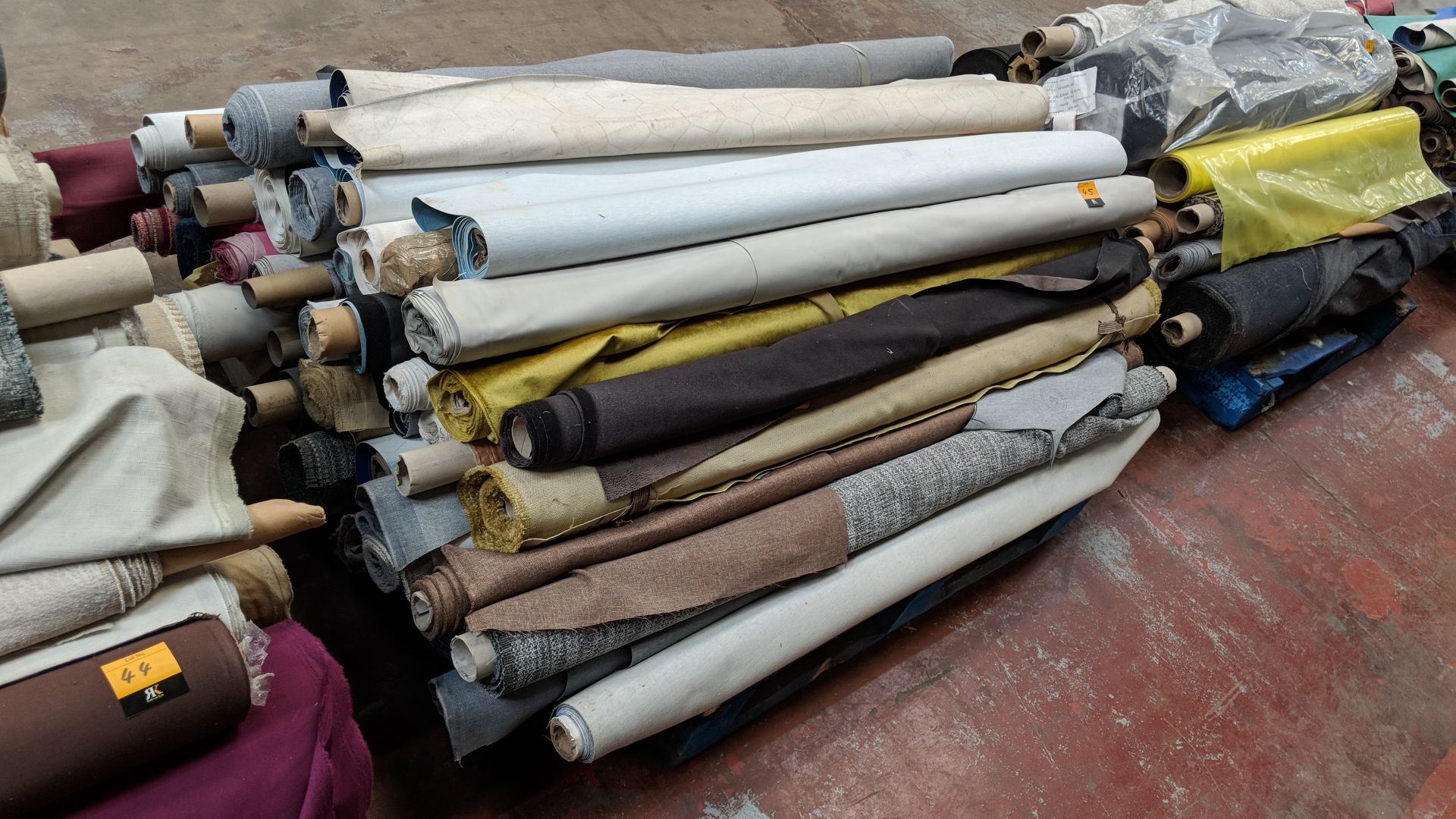 The contents of a pallet consisting of a vast quantity of upholstery fabric IMPORTANT: Please