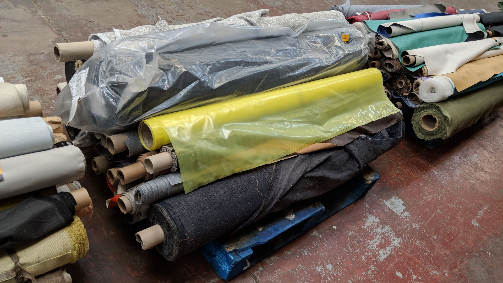 The contents of a pallet consisting of a vast quantity of upholstery fabric IMPORTANT: Please