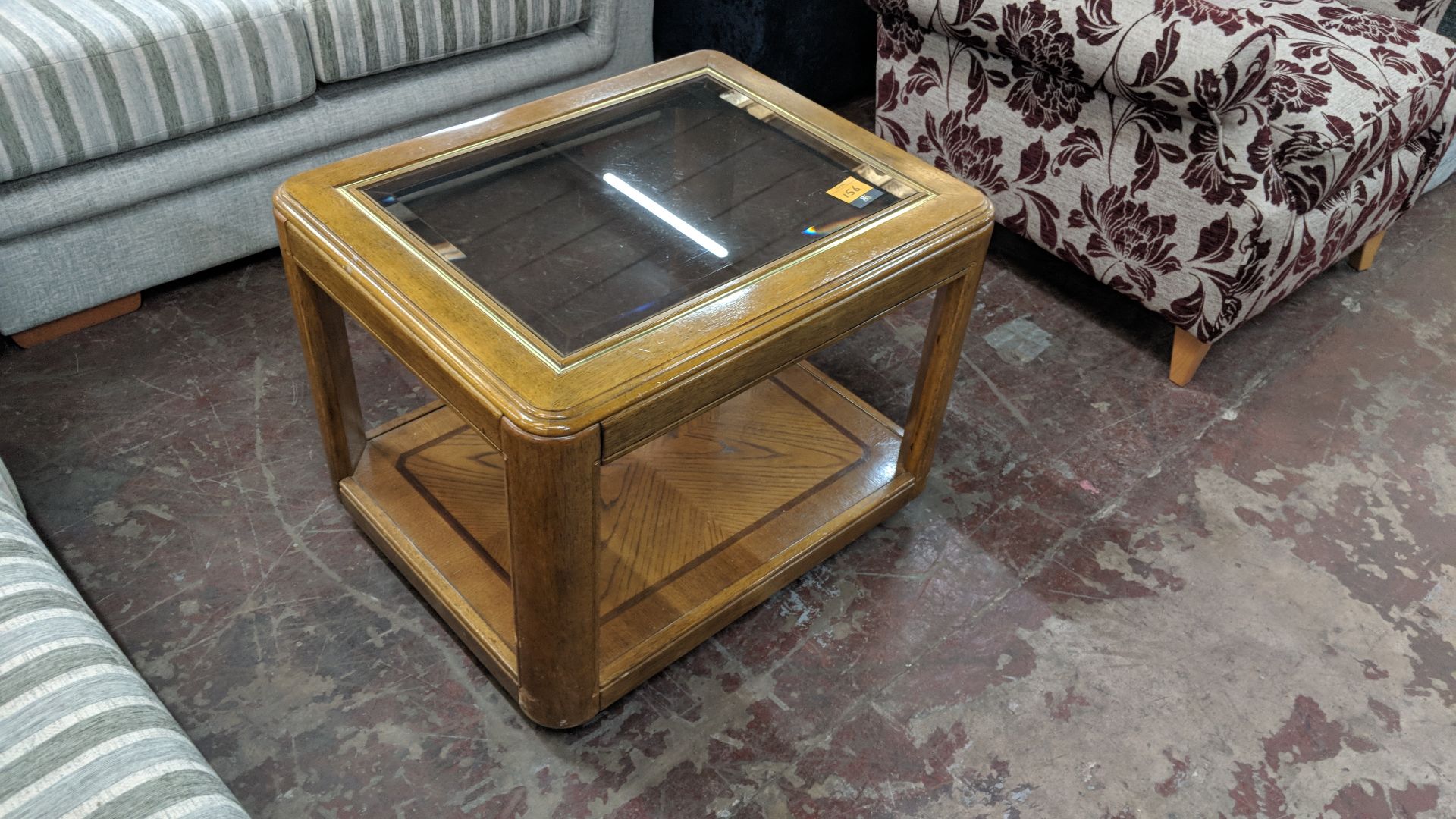 Occasional table with wooden shelf below & bevelled glass top, circa 700mm x 550mm IMPORTANT: Please