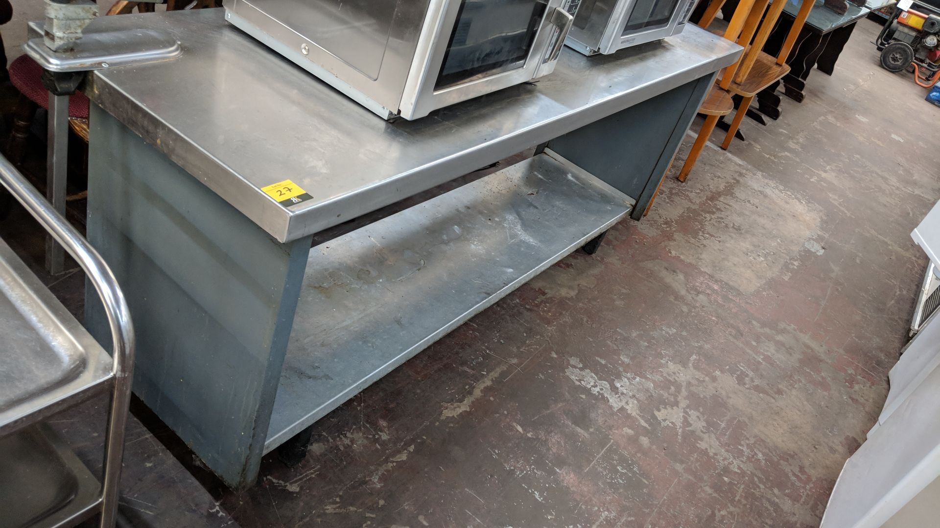 Long stainless steel twin-tier table with commercial can opener attached to same, table being - Image 3 of 4