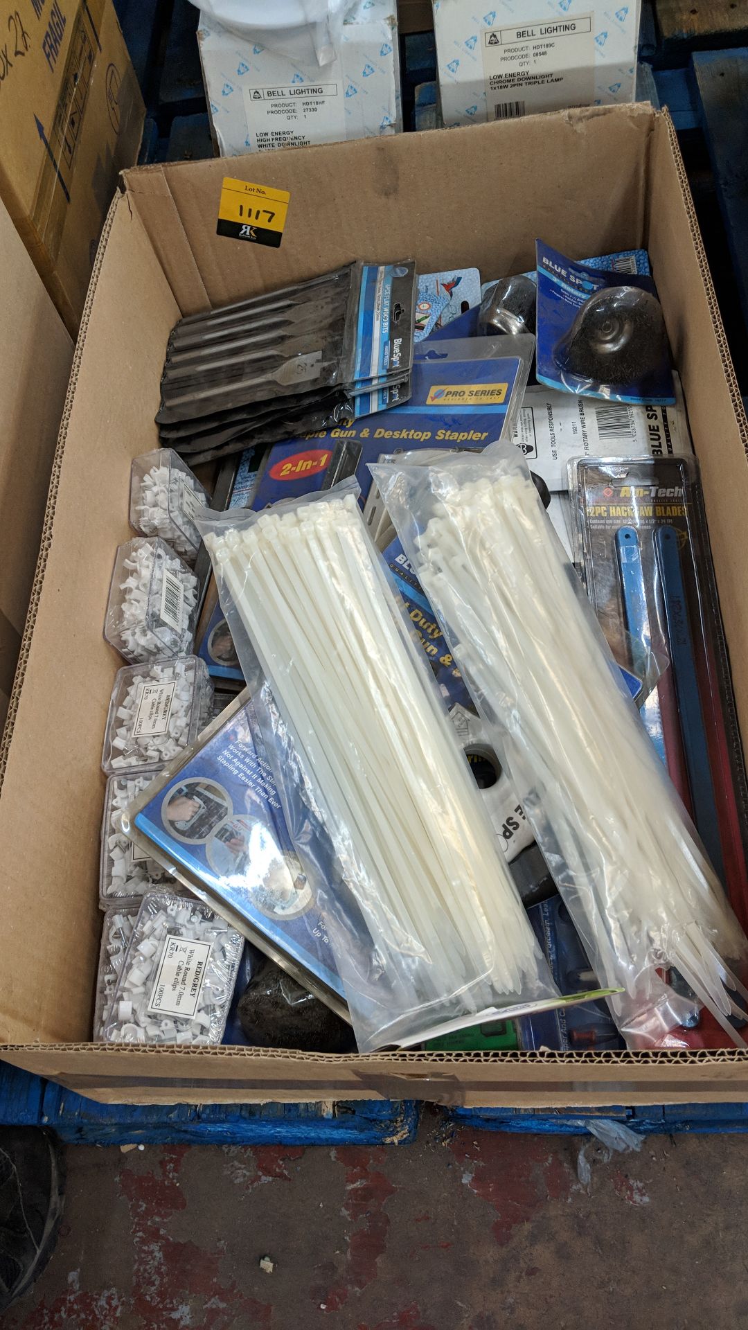 Box of assorted cable ties, cable clips, wood bits, staplers and more The vast majority of