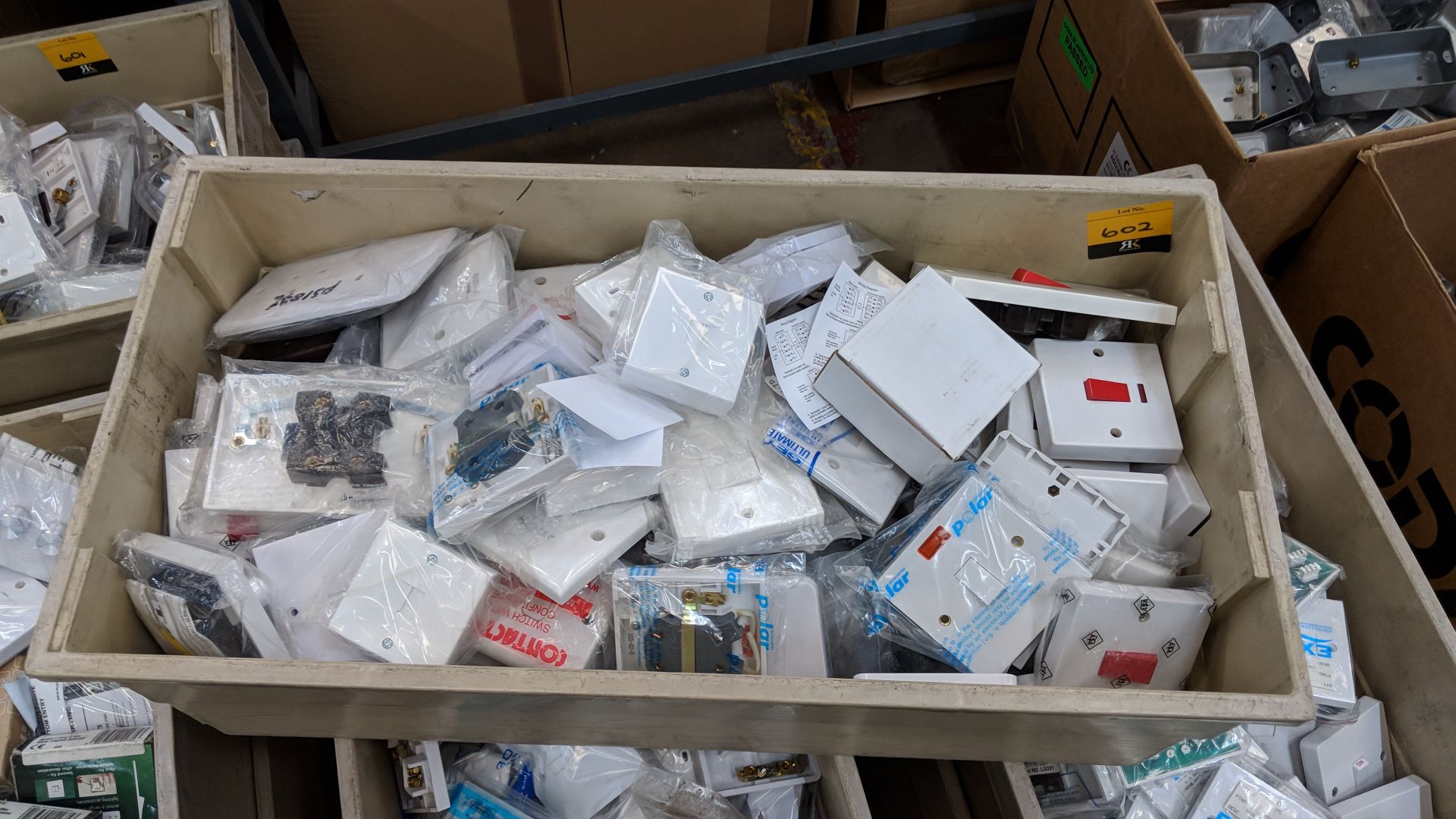 Contents of a crate of assorted, primarily white moulded, switches, sockets and similar by a - Image 2 of 3