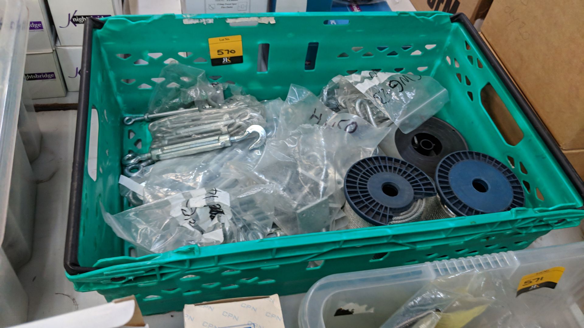 Contents of a crate of assorted steel cable reels, hooks for use with same and similar - crate