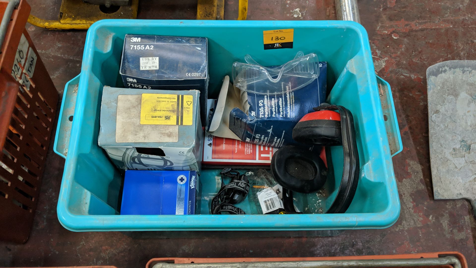 Contents of a crate of ear defenders, safety goggles & other safety related items