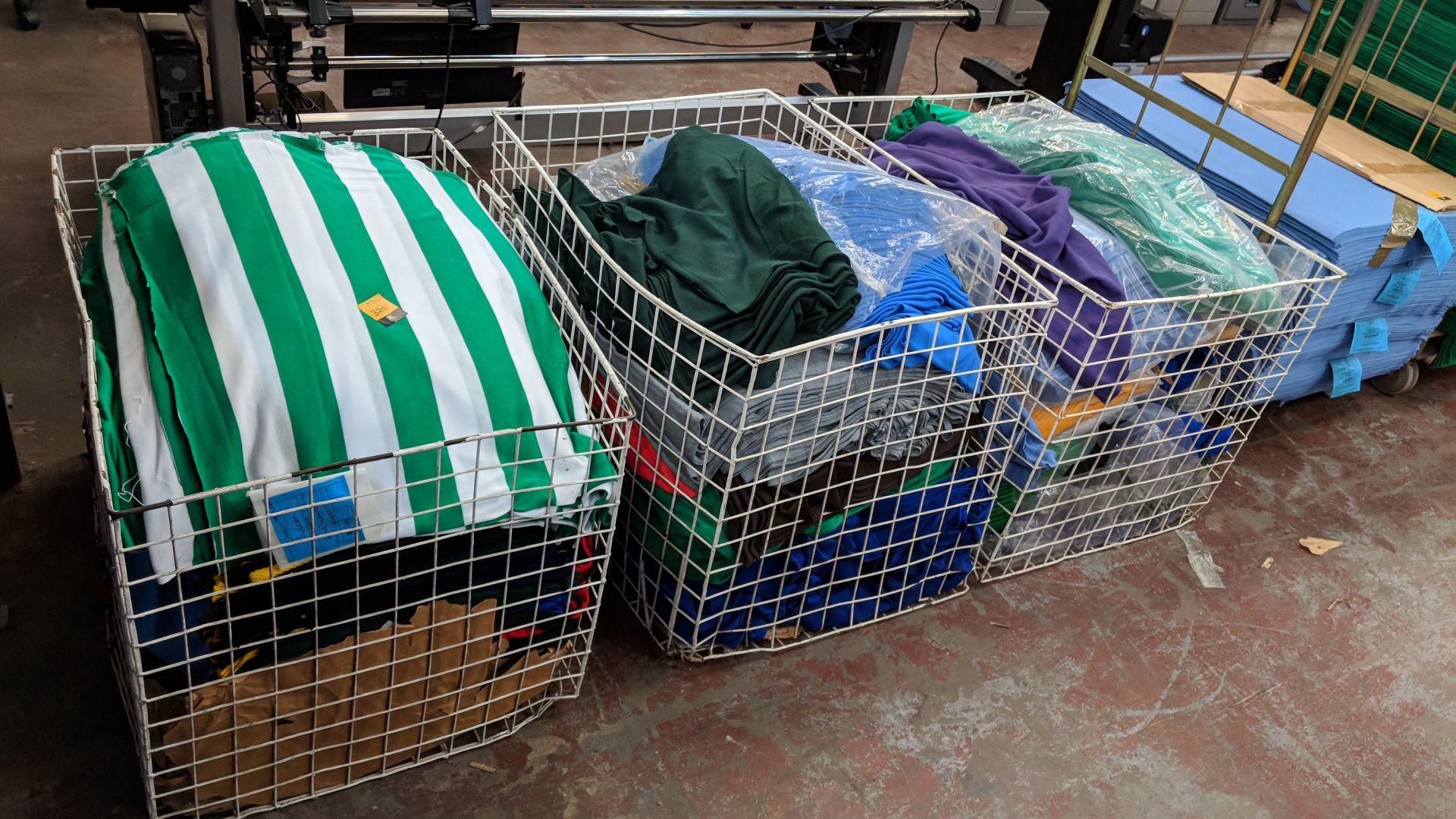 Contents of 3 cages of assorted knitted fabrics