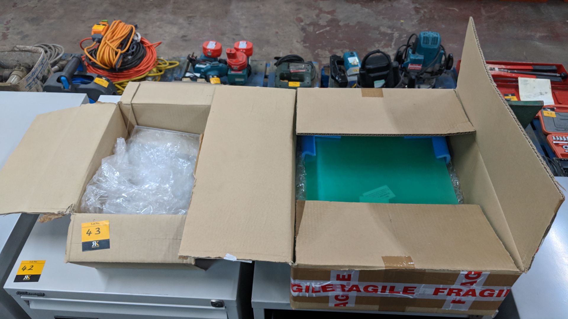 Contents of 2 boxes of perspex sheets